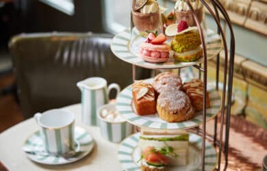 Enjoy a classic afternoon tea with delicate pastries, sandwiches, and fine china in a cosy, elegant hotel setting.